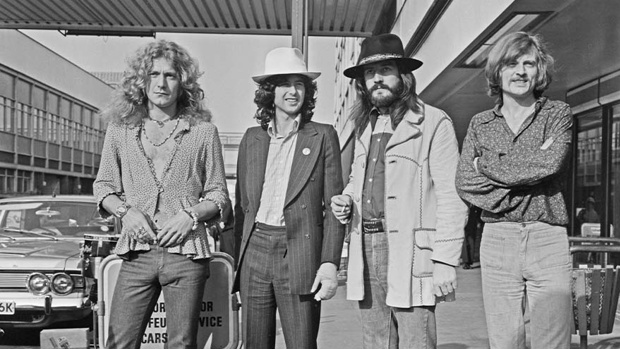 Led Zeppelin at Heathrow Airport in London, UK, 11th June 1973. (left to right) Singer Robert Plant, guitarist Jimmy Page, drummer John Bonham (1948 - 1980) and bassist/keyboard player John Paul Jones. Photo / Getty Images